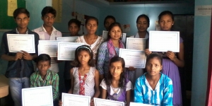 A group of girls finally got their Certificate of Completion under Digital Literacy Programme.jpg