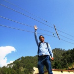 Soochna Sevak showing the height of the wires from ground level